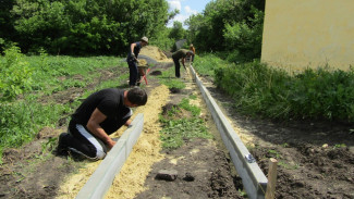 Общественники нижнедевицкого села Першино построят пешеходную дорожку